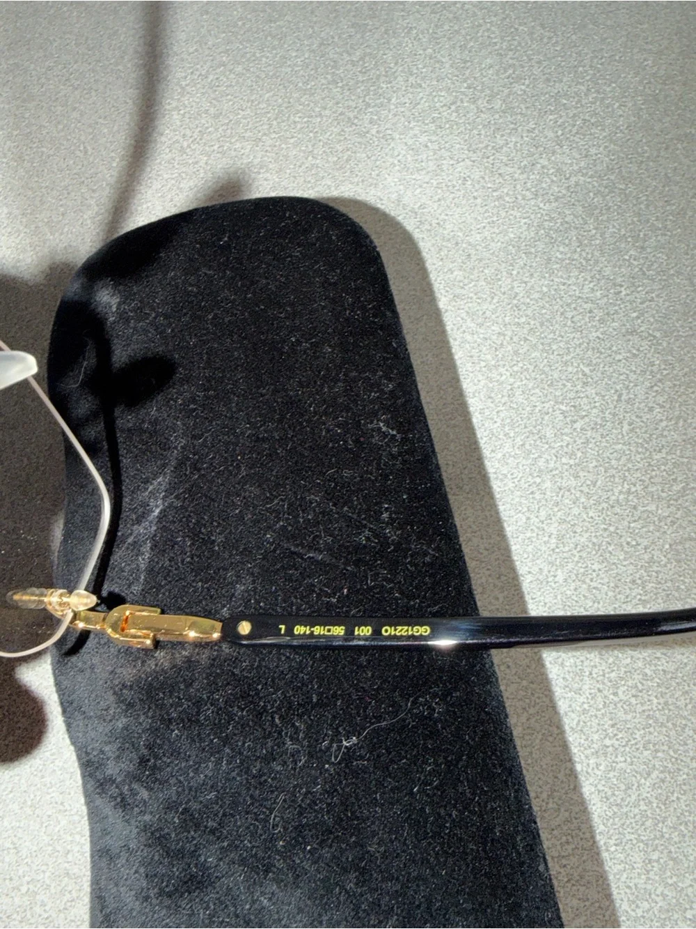 Gucci Men’s Rimless Eyeglasses Gold and Black Accents